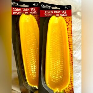 Eight plastic corn on the cob‎ holders. New inbox.